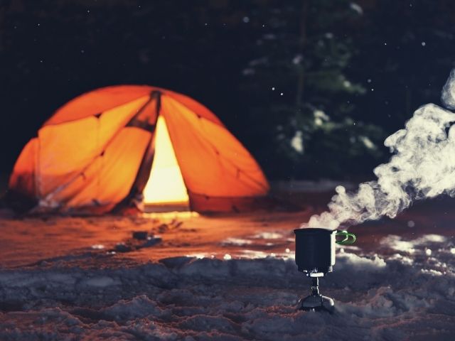 tent and brewing coffee