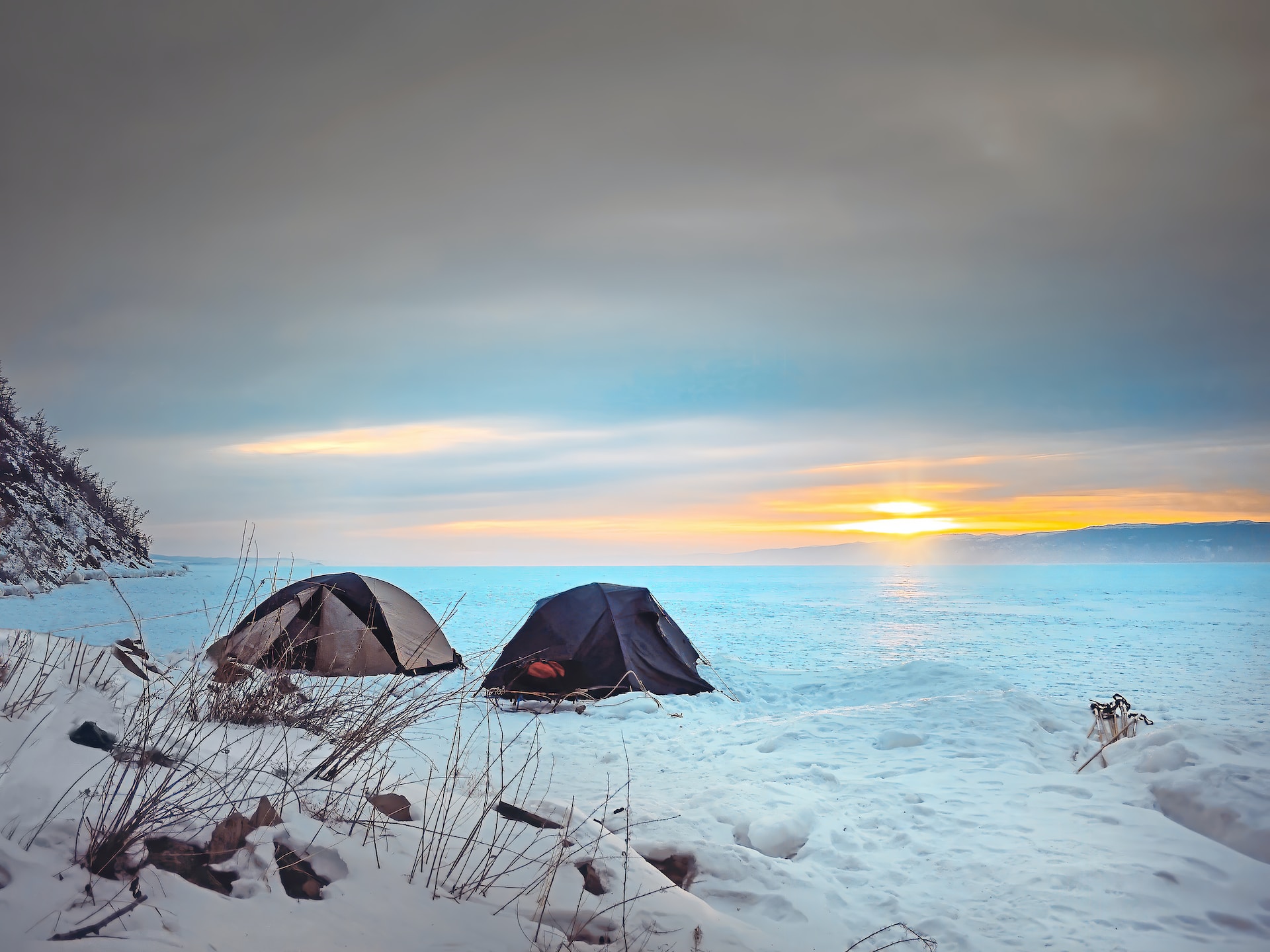 Winter camping near a lake